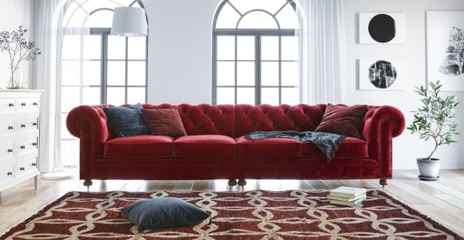 15 dark brown pillows with red couch 2