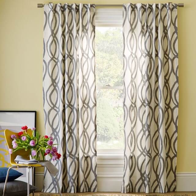 10 gray and white striped curtain with yellow wall