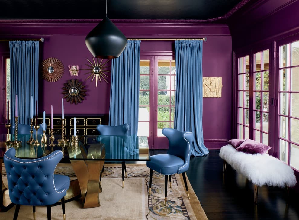 3 blue curtains with purple walls