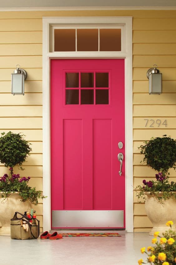 9 pink front door with yellow houses