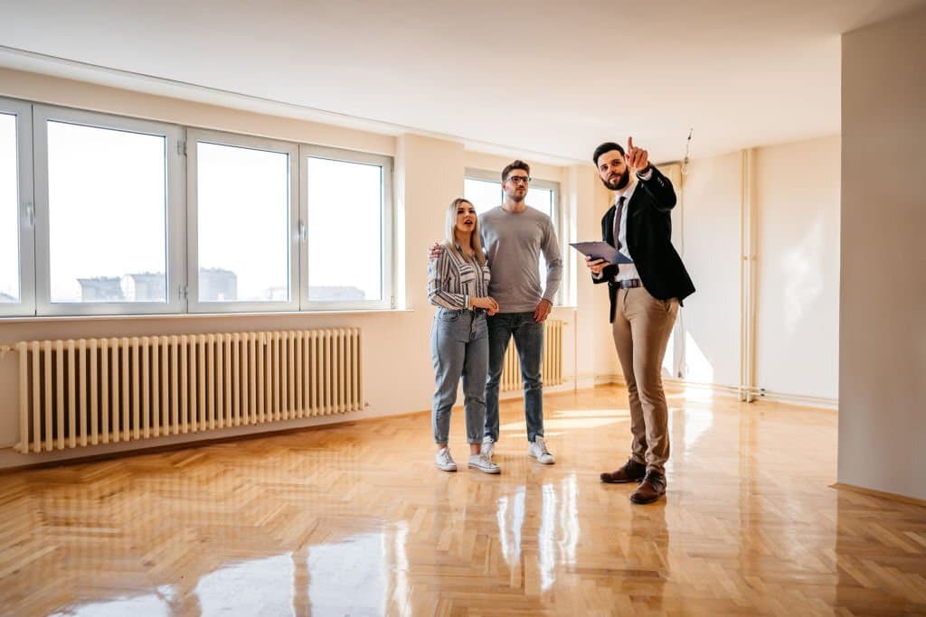 real estate agent showing an apartment
