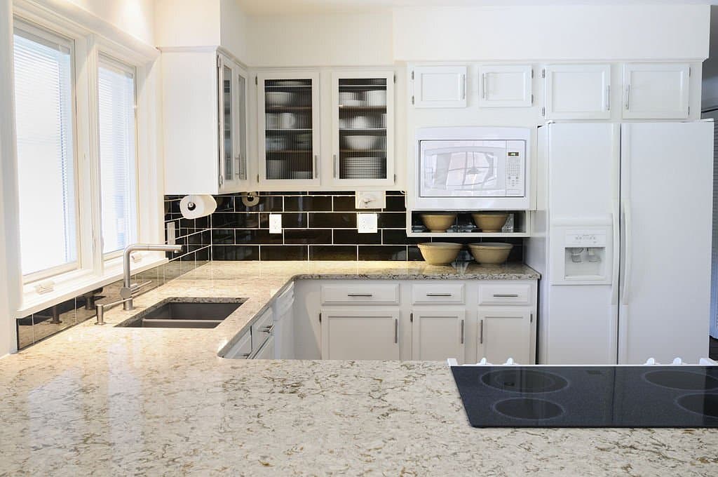modern kitchen with white cabinets