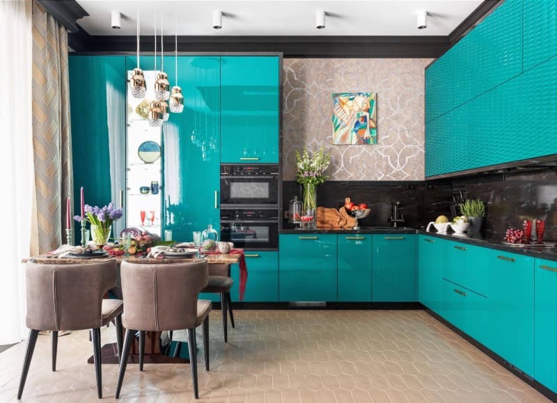 Turquoise cabinets with black stainless steel appliances