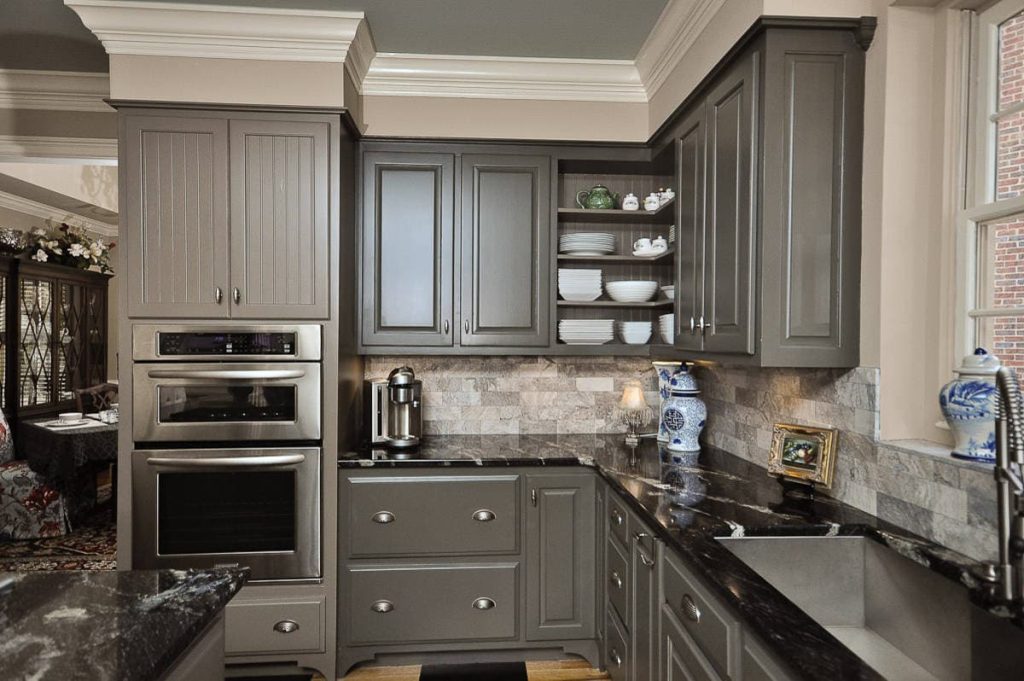 black marble countertop with gray cabinets