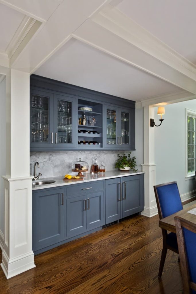 blue cabinets with gray walls