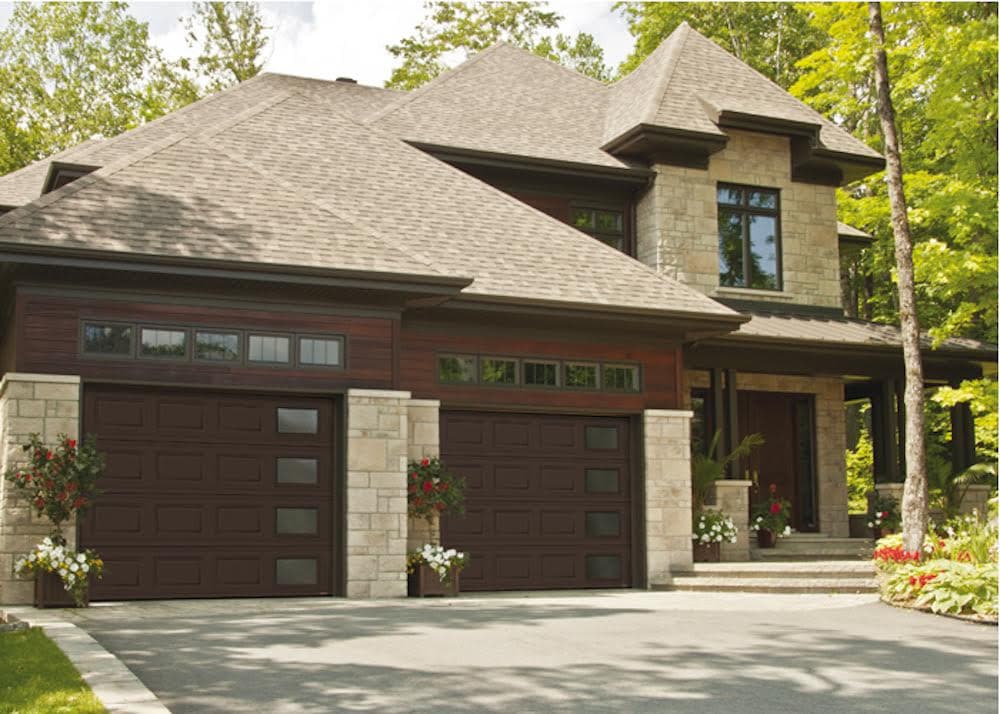 brown garage door with brown house