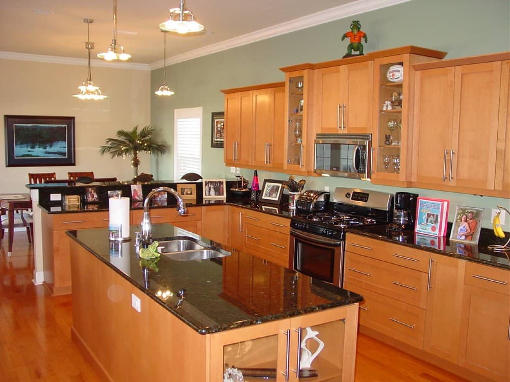 brown granite with honey maple cabinets