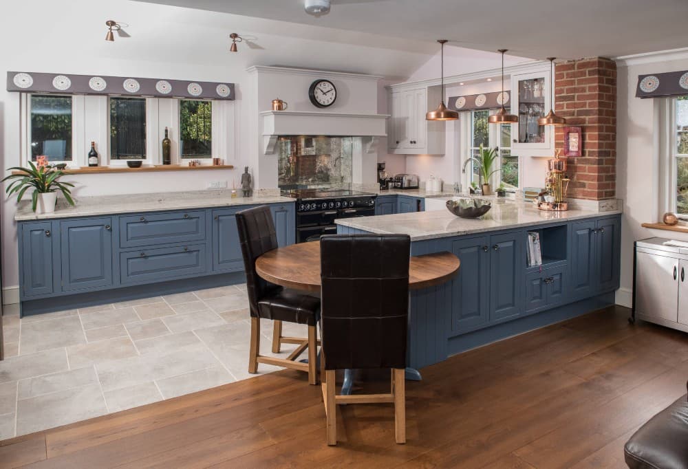 cornflower blue cabinets with black stainless steel appliances