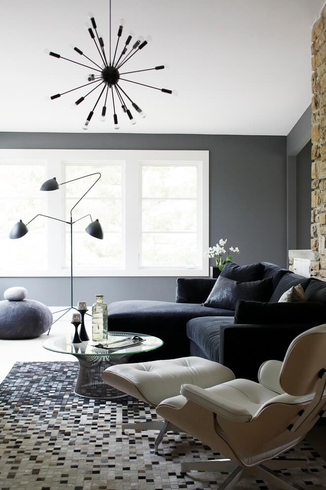 dark gray couch with gray walls