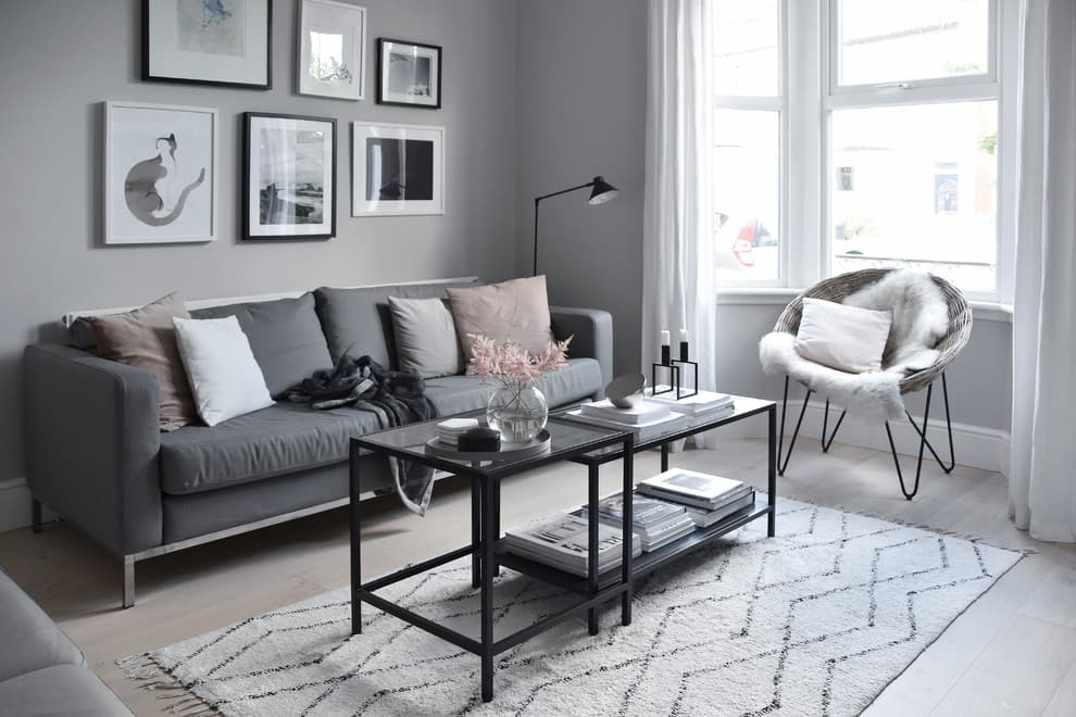 dark gray furniture with light hardwood floors
