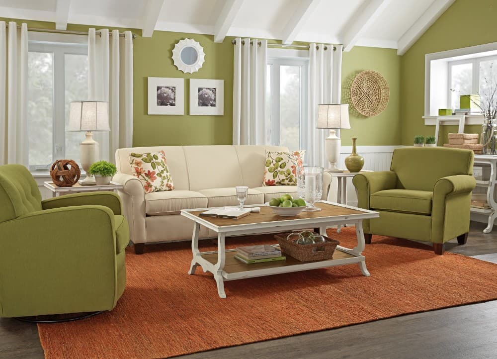 dark green furniture with light hardwood floors