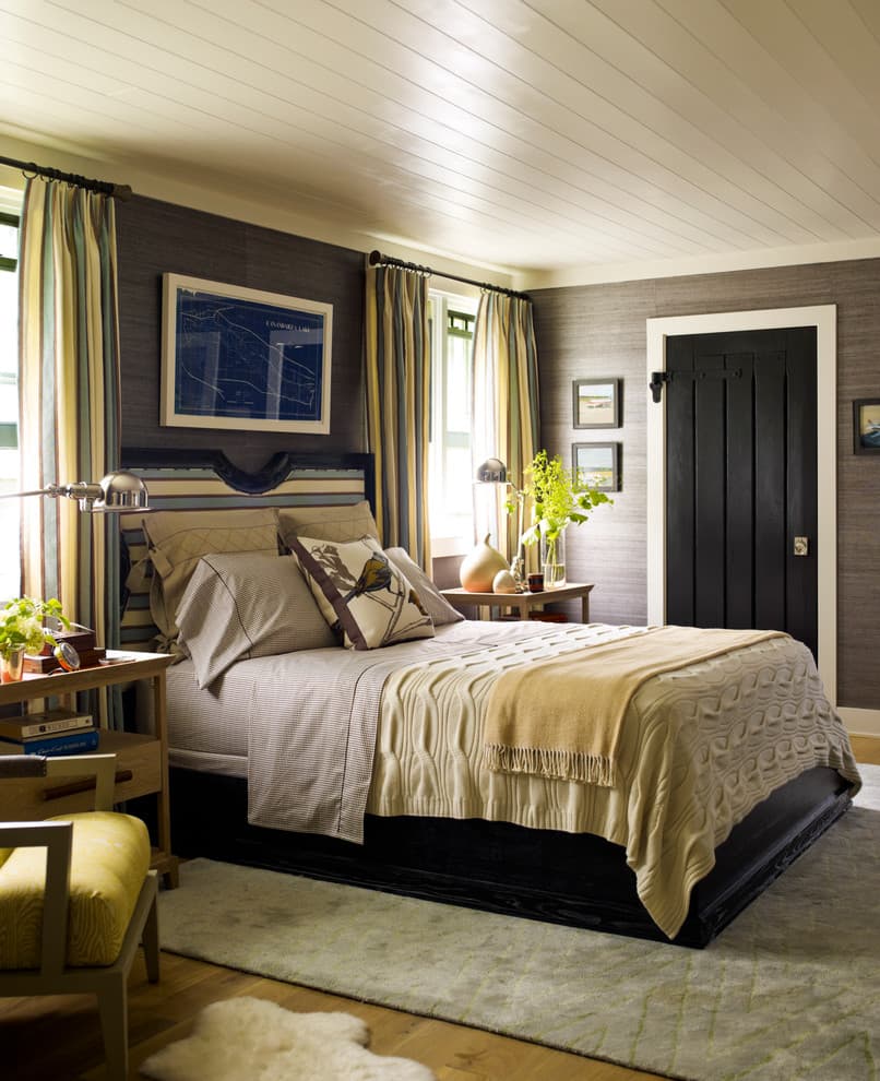 gold bedding with gray walls