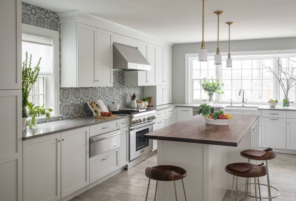 gray countertop with white cabinets