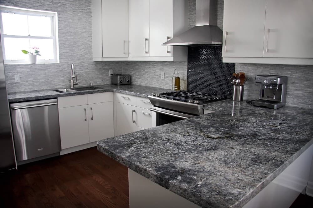 gray granite with cream cabinets