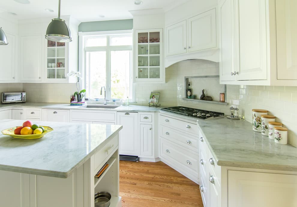 green countertop with white cabinets