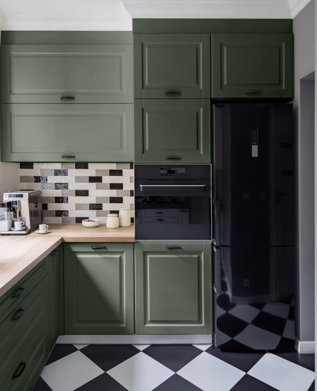 olive green cabinets with black stainless steel appliances