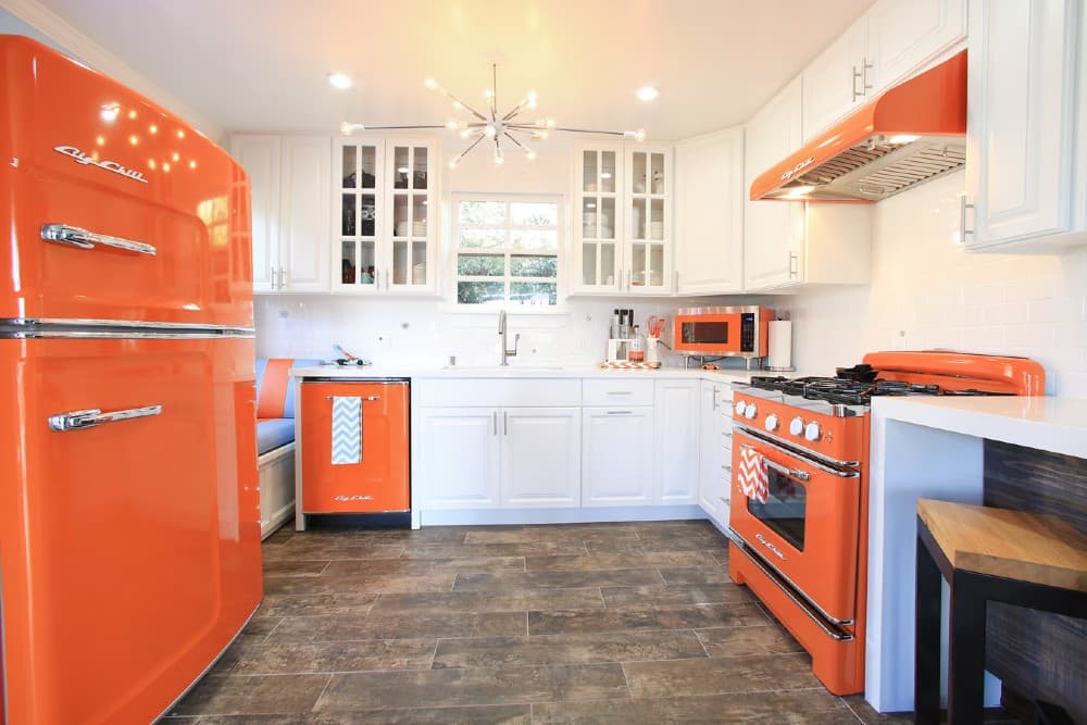 orange appliances with white cabinets