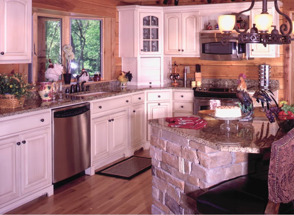 pink cabinets with brown granite countertops
