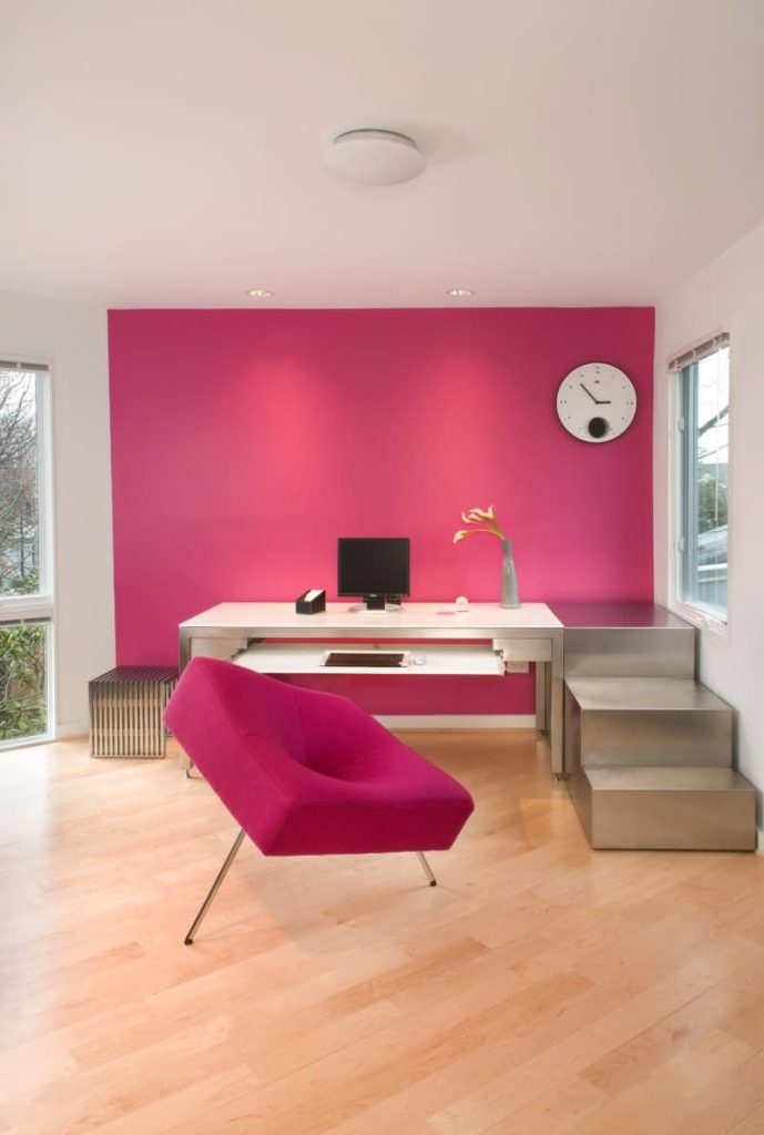 pink furniture with light hardwood floors