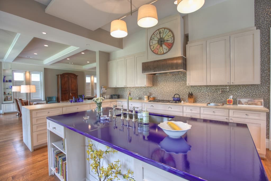 purple granite with cream cabinets
