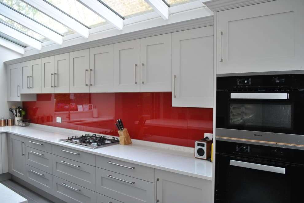 red walls with gray kitchen cabinets