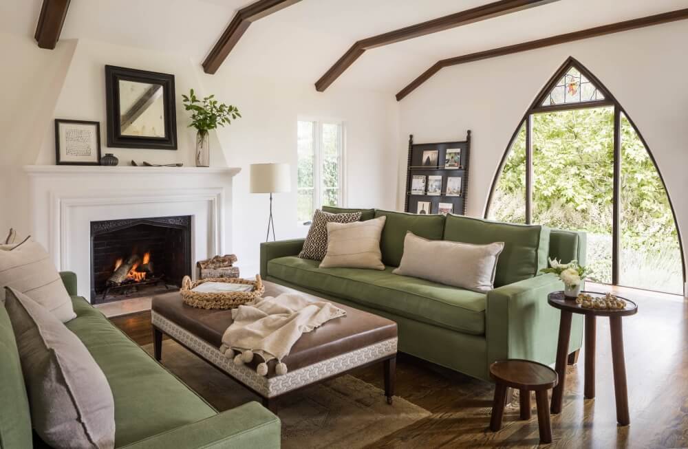 sage green couch with gray walls