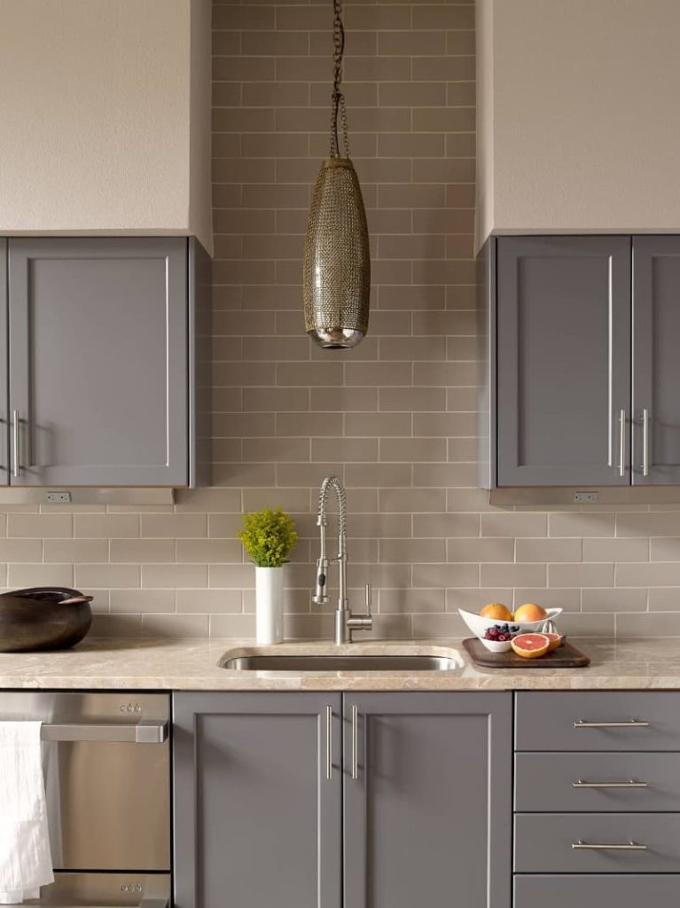 taupe walls with gray kitchen cabinets