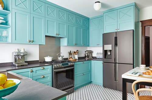 teal cabinets with black stainless steel appliances