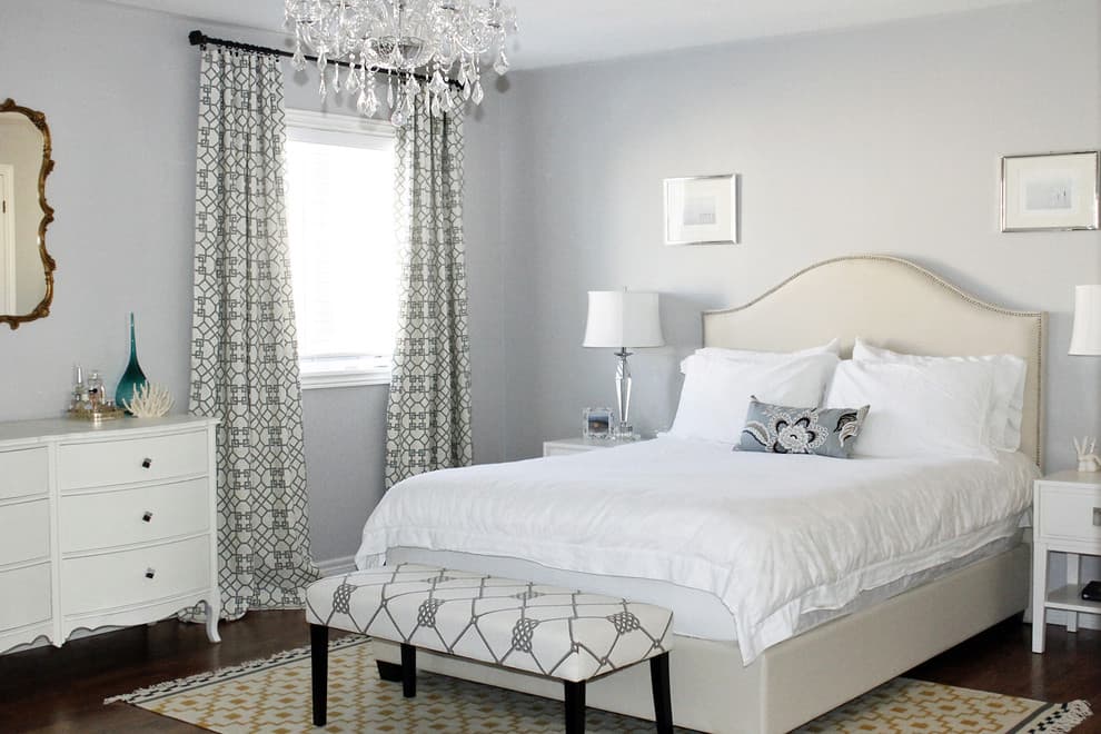 white bedding with gray wall