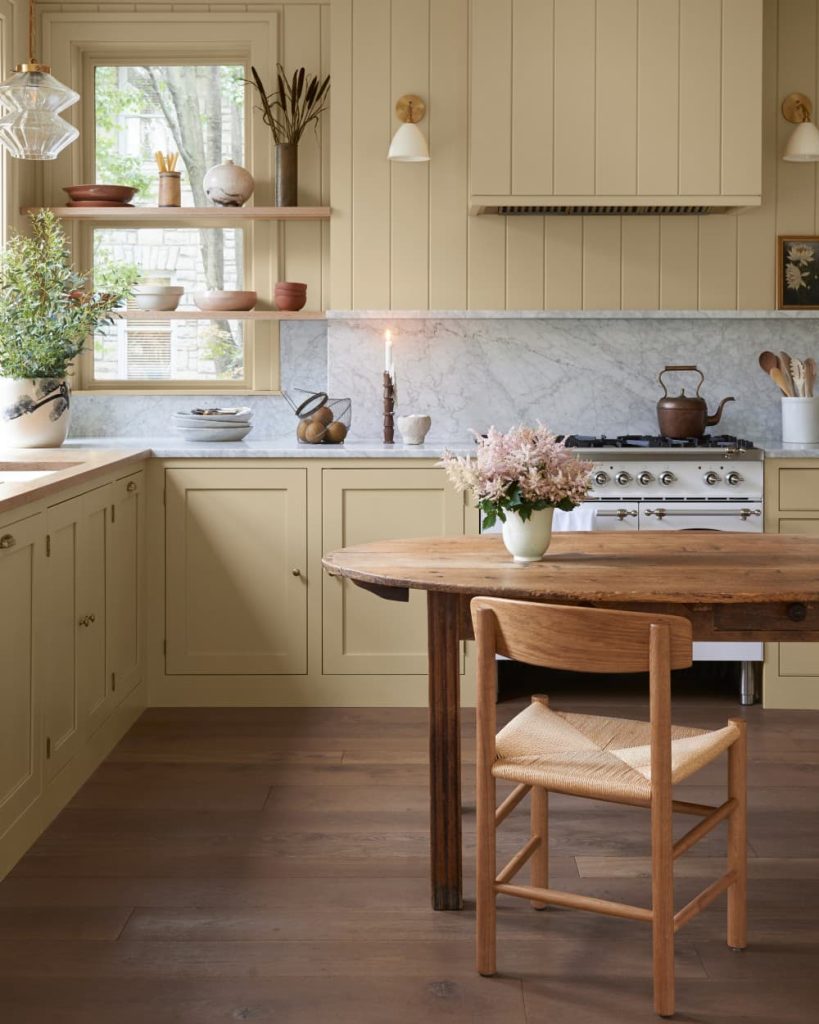 yellow cabinets with gray walls