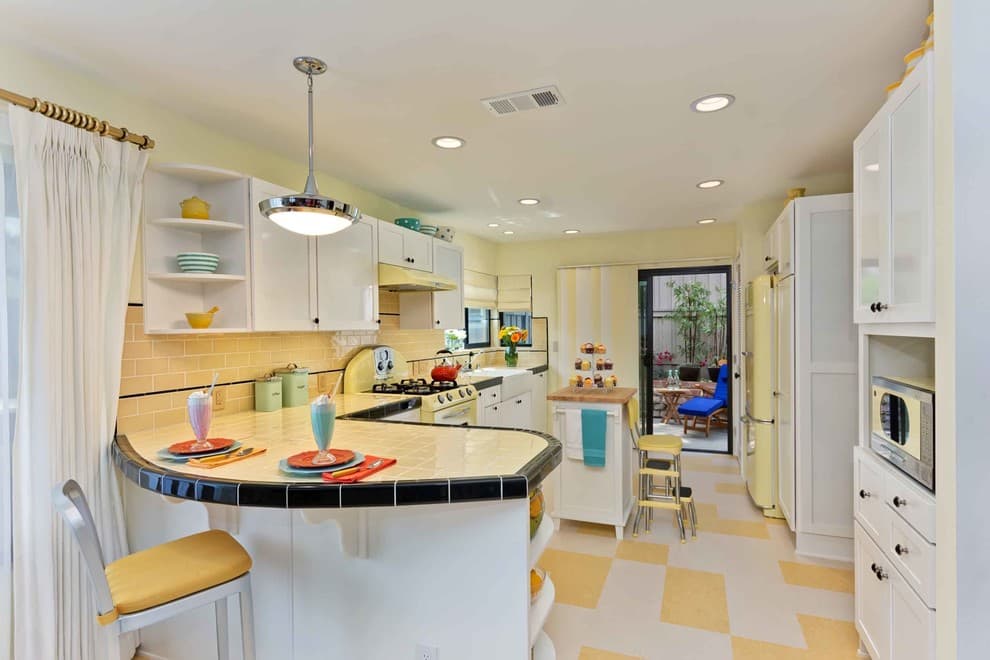 yellow countertop with white cabinets