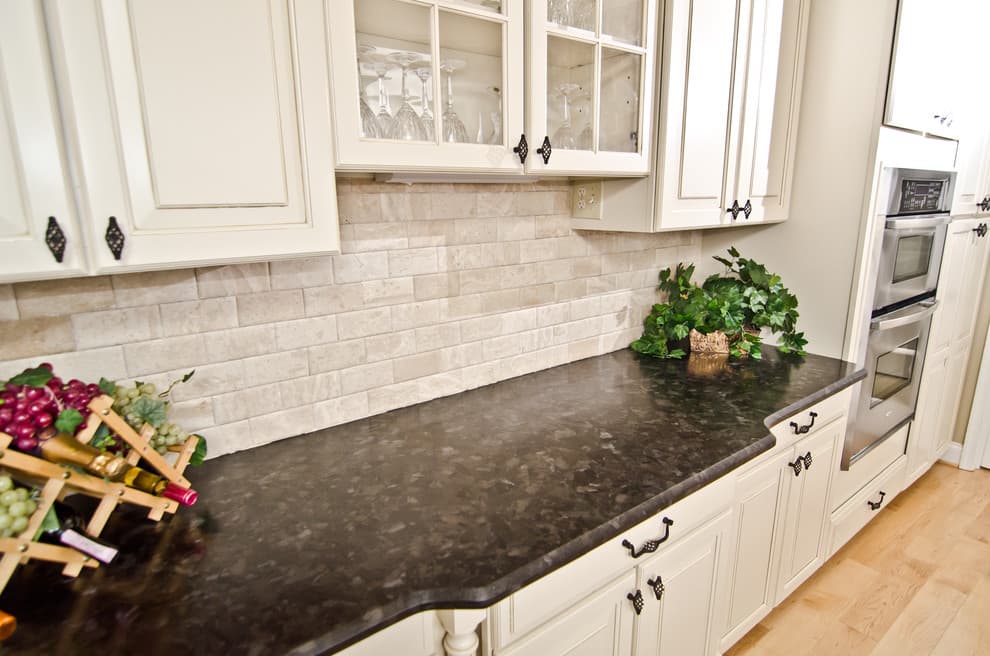 Antique Brown Granite with white cabinets