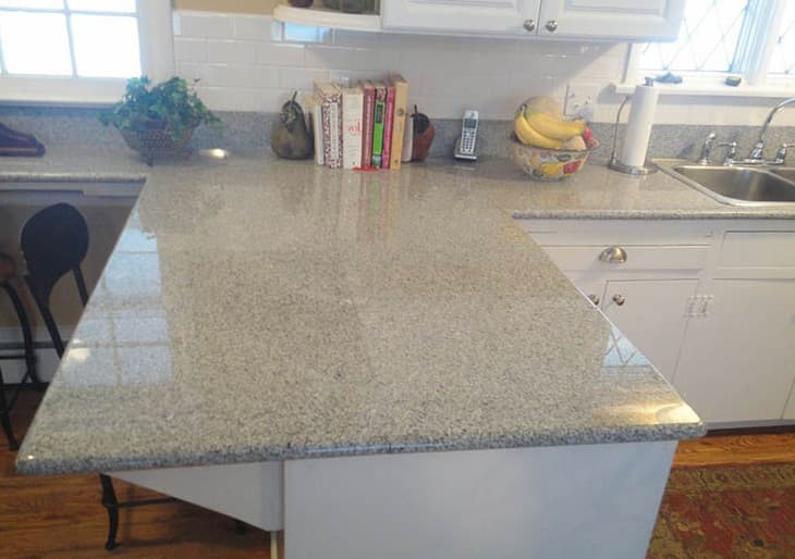 Imperial Coffee Granite with white cabinets