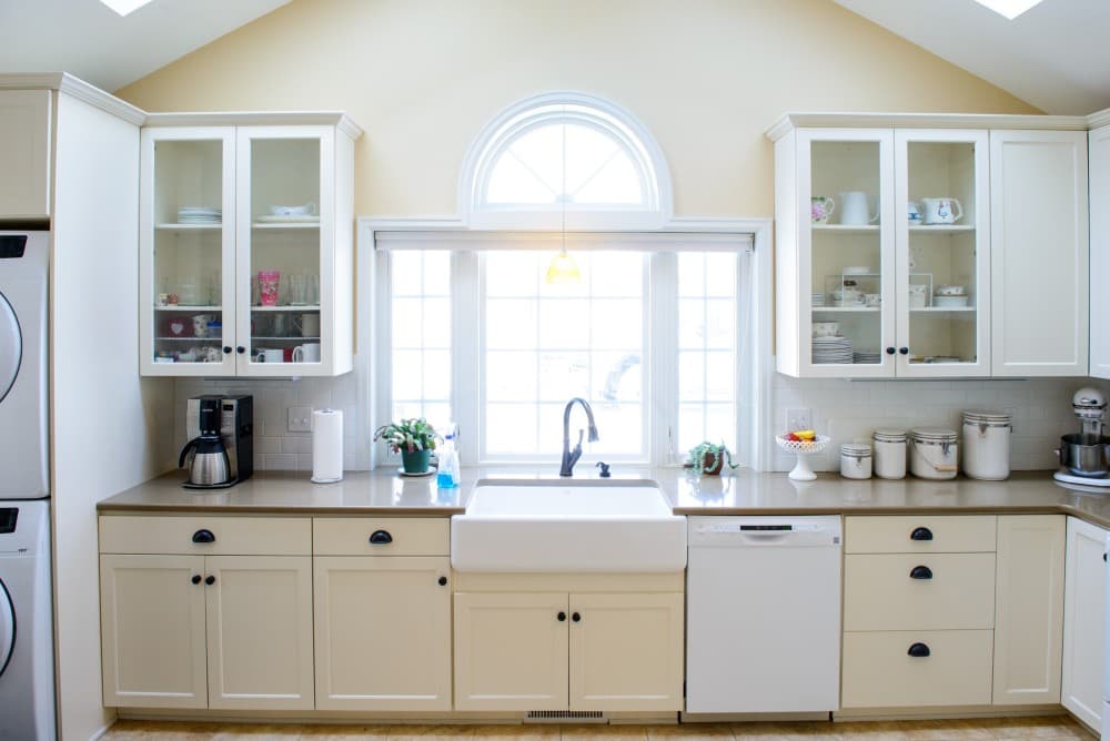 beige cabinets with white appliances