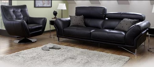 black gold pillows with black leather couch