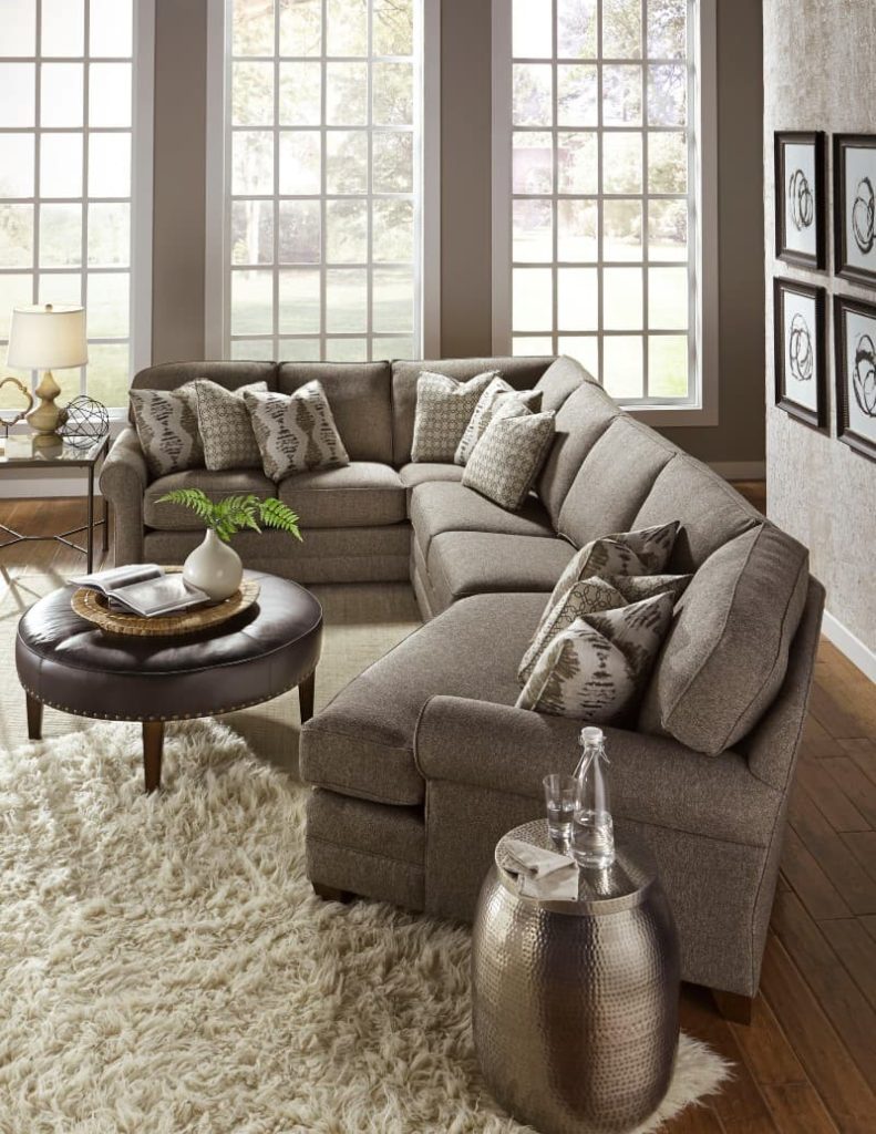 brown coffee table with gray couch