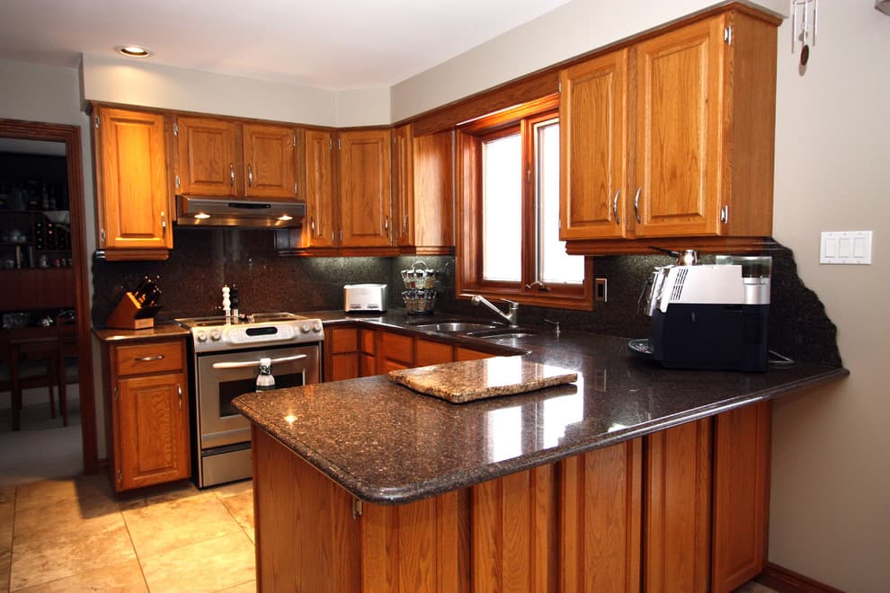 brown granite with honey oak cabinets