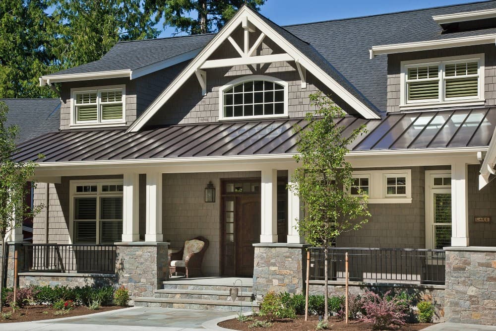 brown metal roof with gray siding