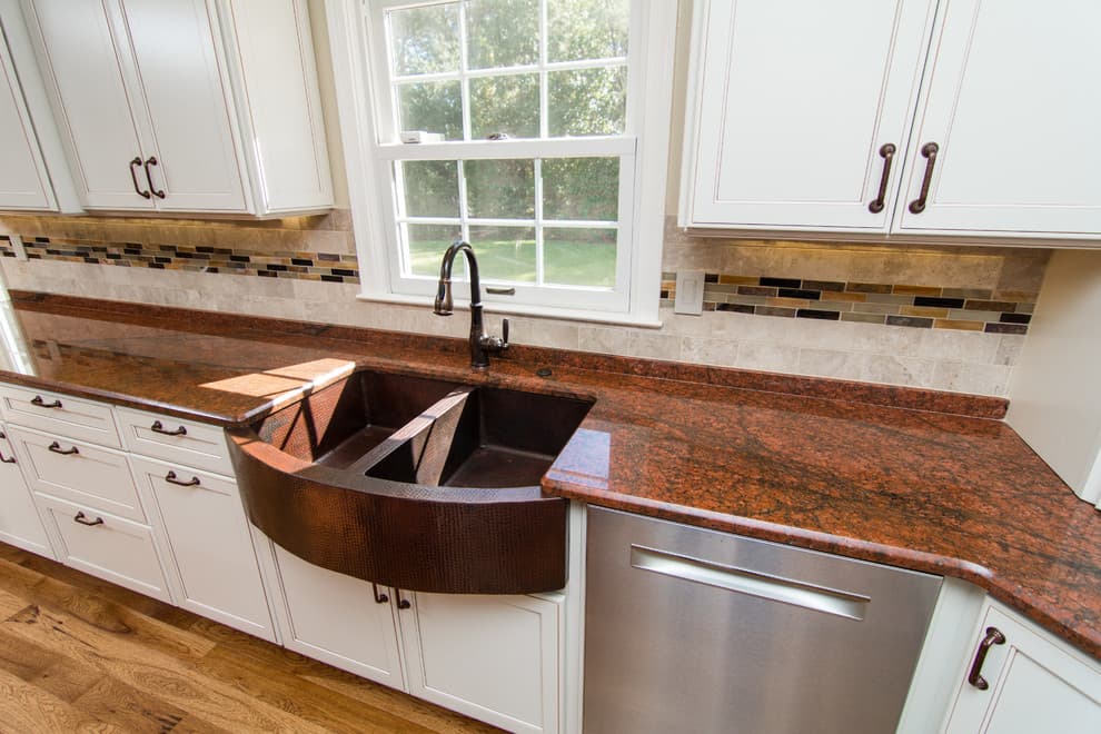red dragon Granite with white cabinets