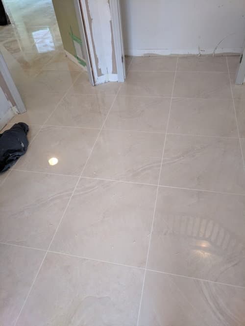 white grout with beige tile