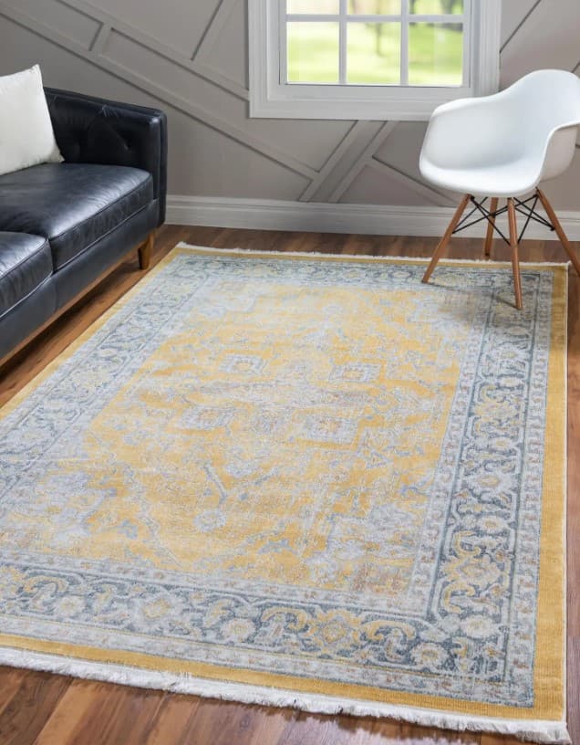 gray yellow rug with black furniture