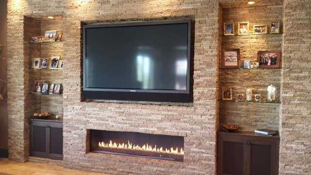 hang tv over fireplace