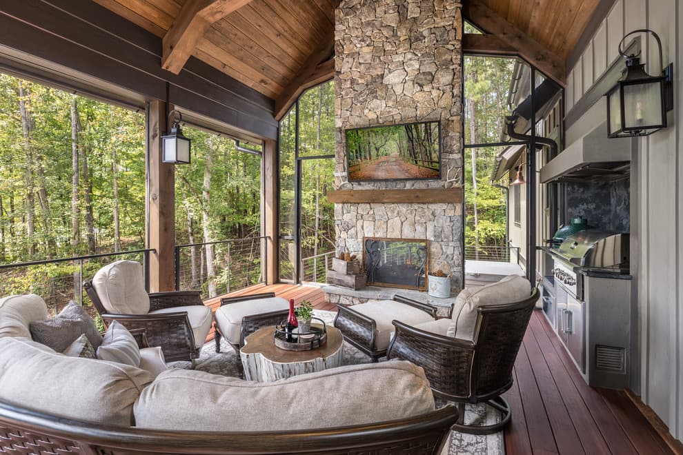 rustic screened in porch with fireplace 1