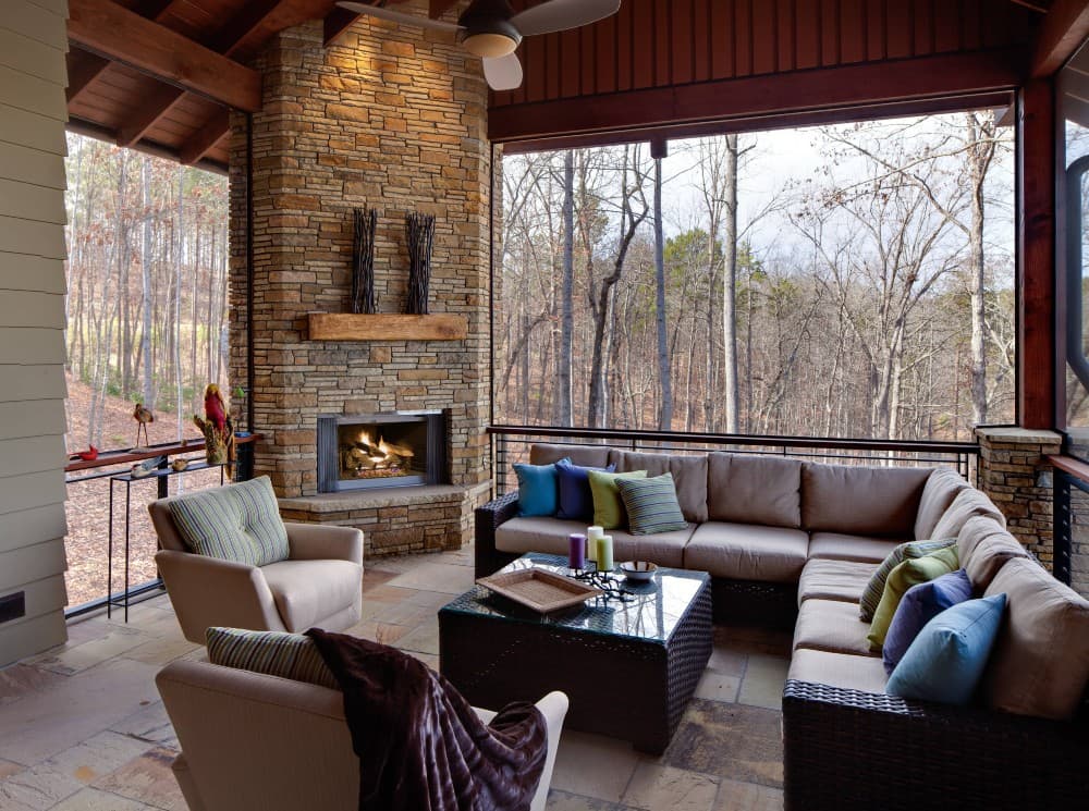 screened in porch with corner fireplace 1