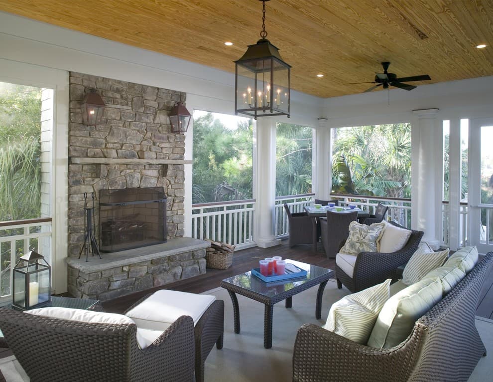 screened in porch with stone fireplace 1