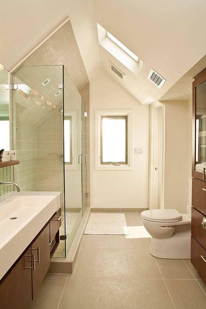 bathroom with sloped ceiling