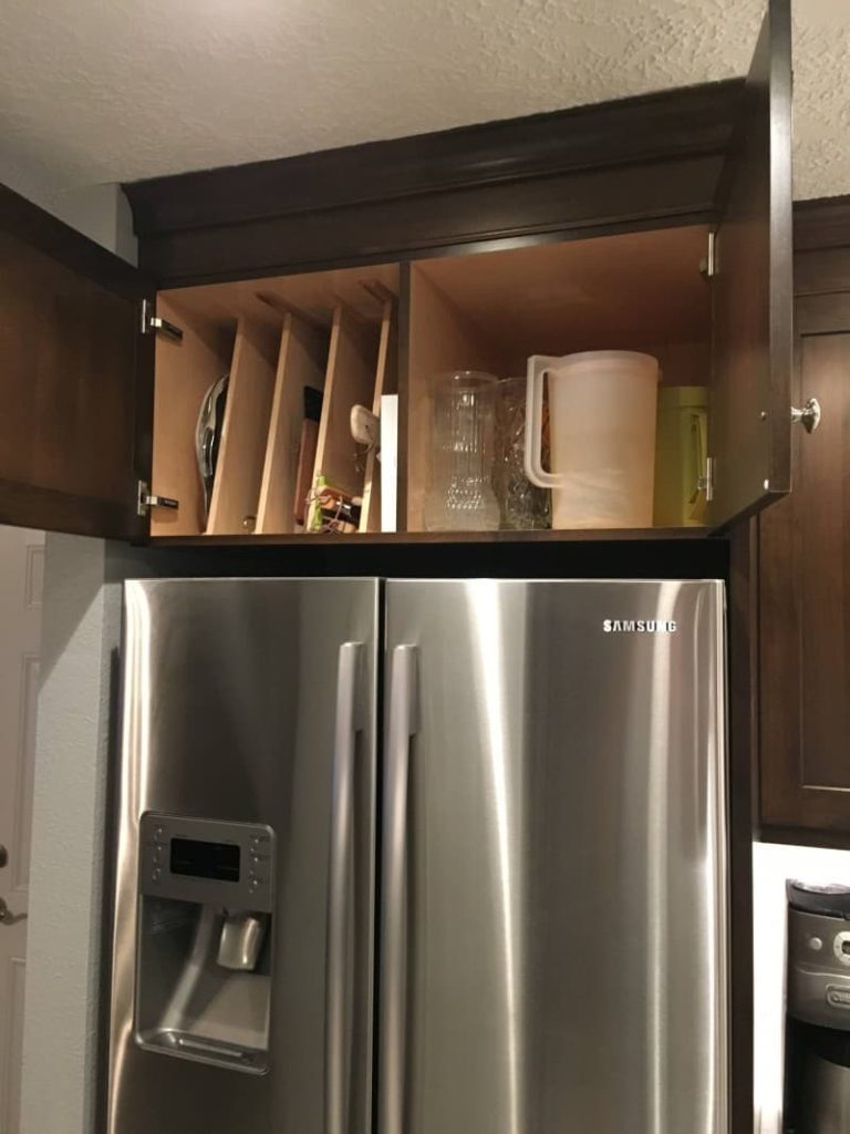 bowls above fridge