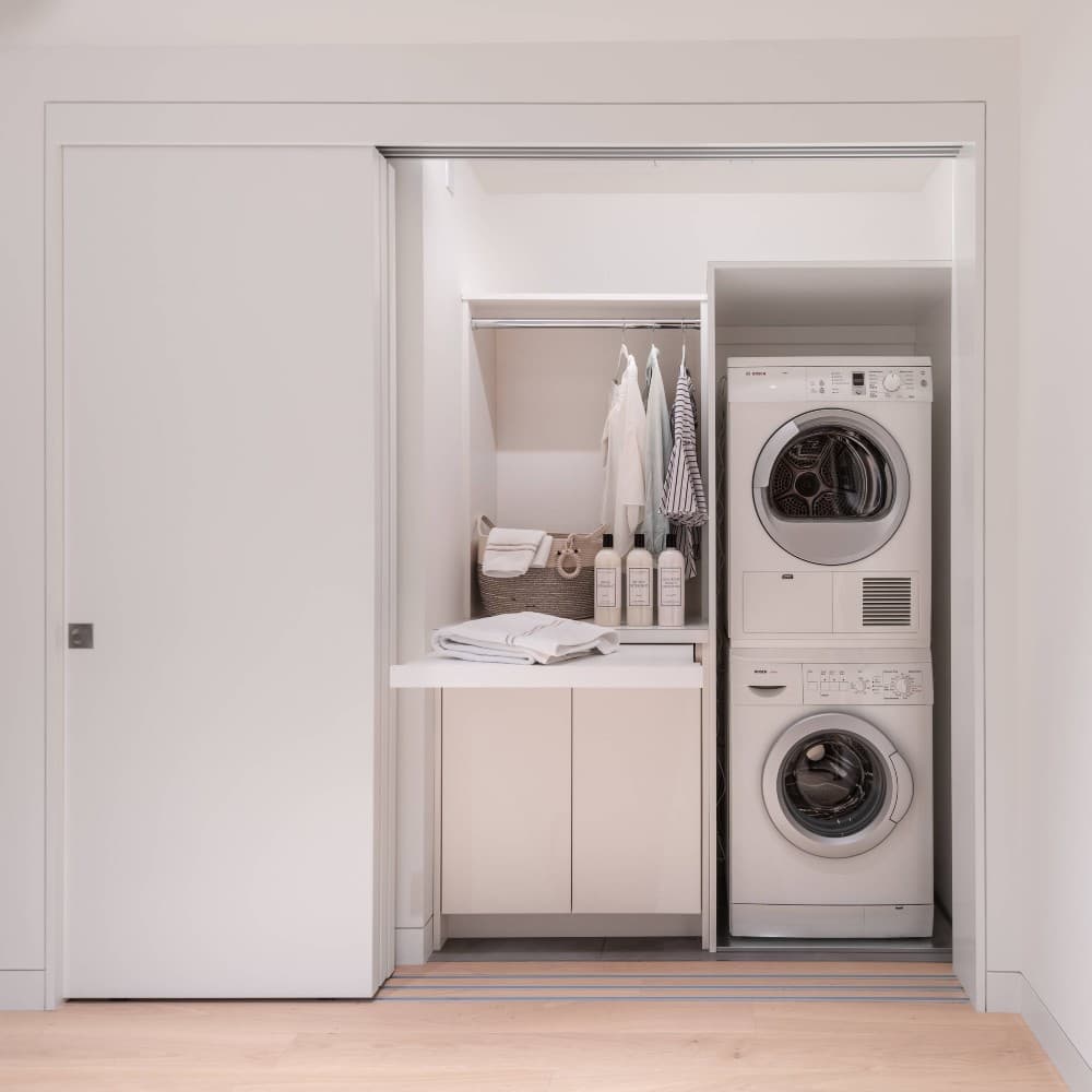 laundry closet with stackable washer dryer 3