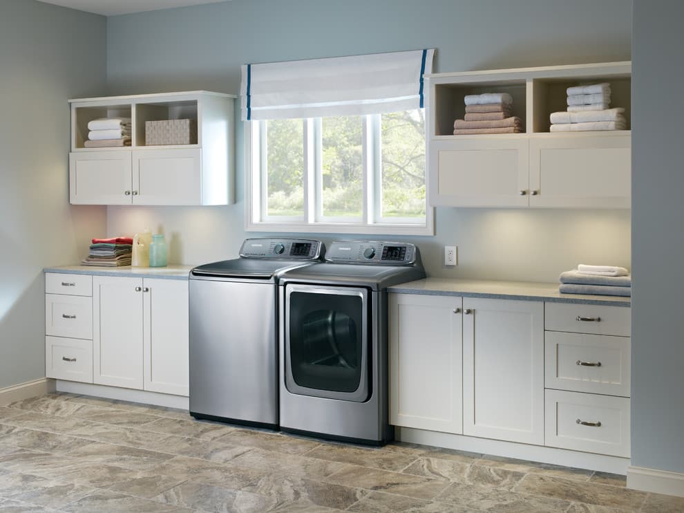 laundry closet with top load washer
