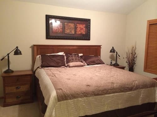 brown cream bedding with oak furniture